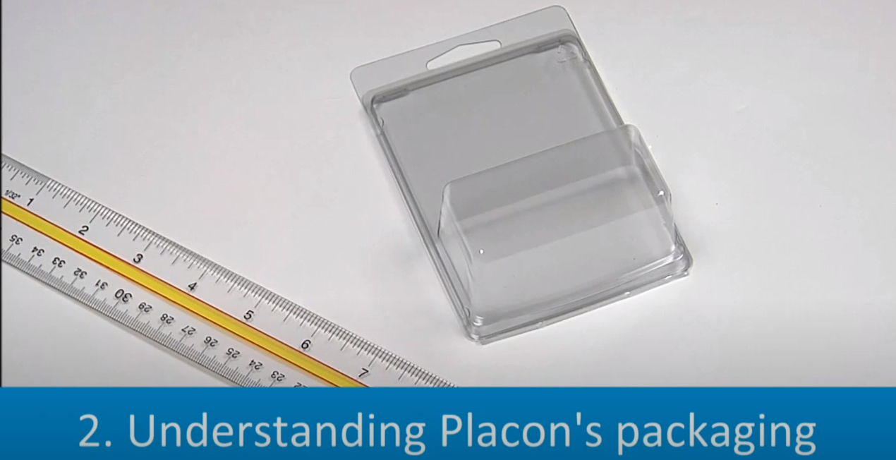Clear plastic blister package shown beside a ruler for scale