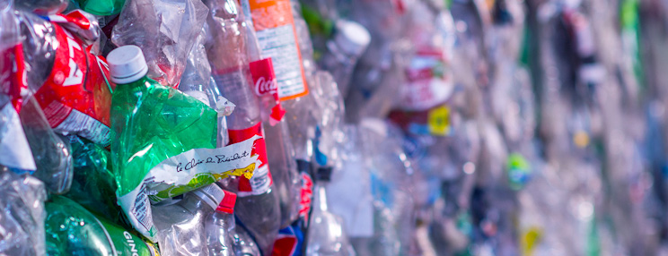 Dense pile of discarded plastic bottles