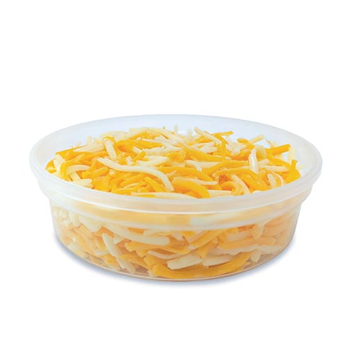 Bowl of shredded orange and white cheese
