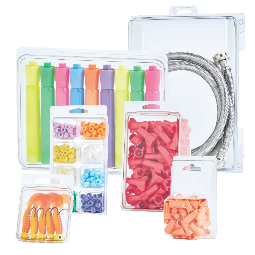 Assortment of colorful plastic tubes, connectors, beads, and braided hoses in clear packaging